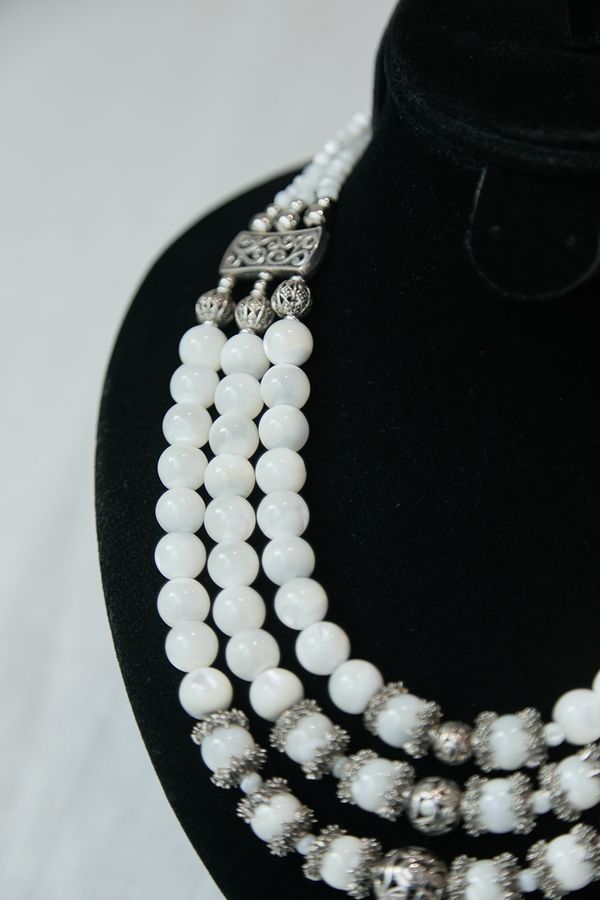 Necklace made of natural stones and mother-of-pearl