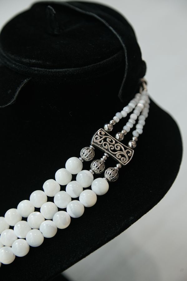 Necklace made of natural stones and mother-of-pearl