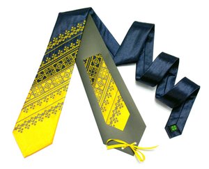 Embroidered tie in yellow and blue