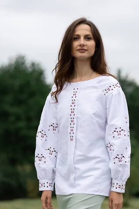 Women's white embroidered shirt with colored ornaments, S
