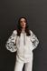 Women's embroidery in ivory color, 34