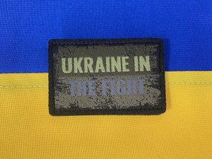 Шеврон кольору хакі з написом "Ukraine in the fight"