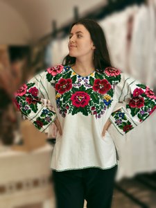 Women's handmade embroidery with colored flowers