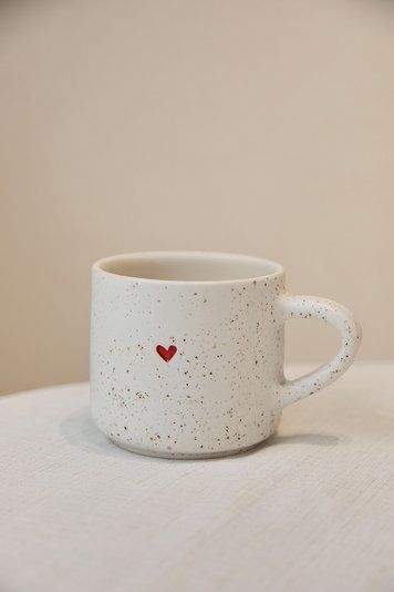 A mug with a red heart