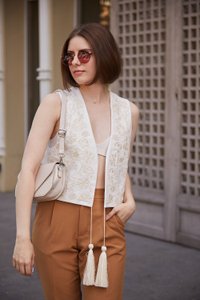 White vest with milk-colored embroidery