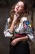 Women's embroidered shirt of white color with colorful embroidery, M/L