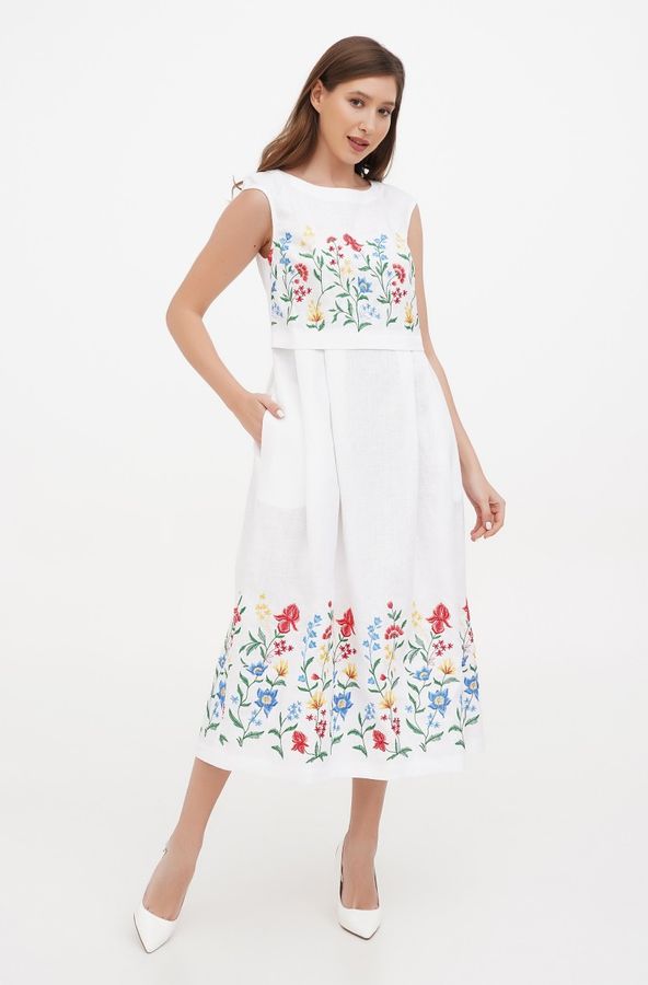 Жіноча біла сукня без рукавів з квітами