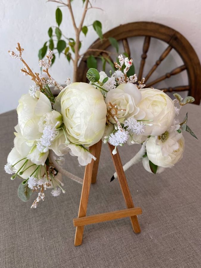 Hoop with milk flowers and twigs