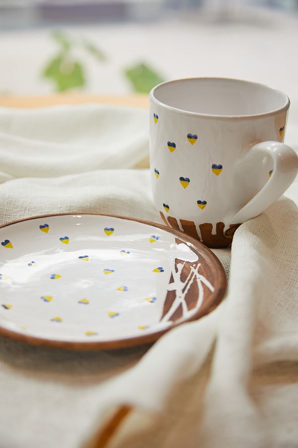 Ceramic cup and saucer with yellow and blue hearts (handmade)