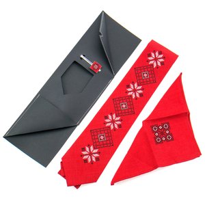 An embroidered set with a tie, scarf, clip and cufflinks in red