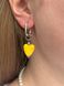 Heart-shaped ceramic earrings in yellow and blue
