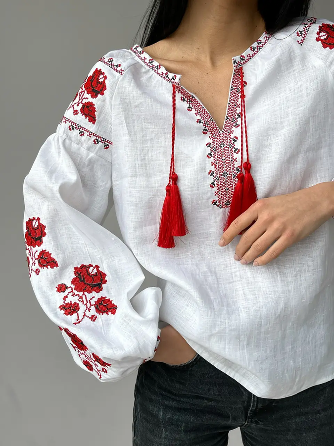 Women's white embroidered shirt with roses