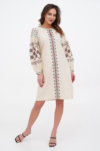 Women's dress, cream-colored linen with black and orange embroidery