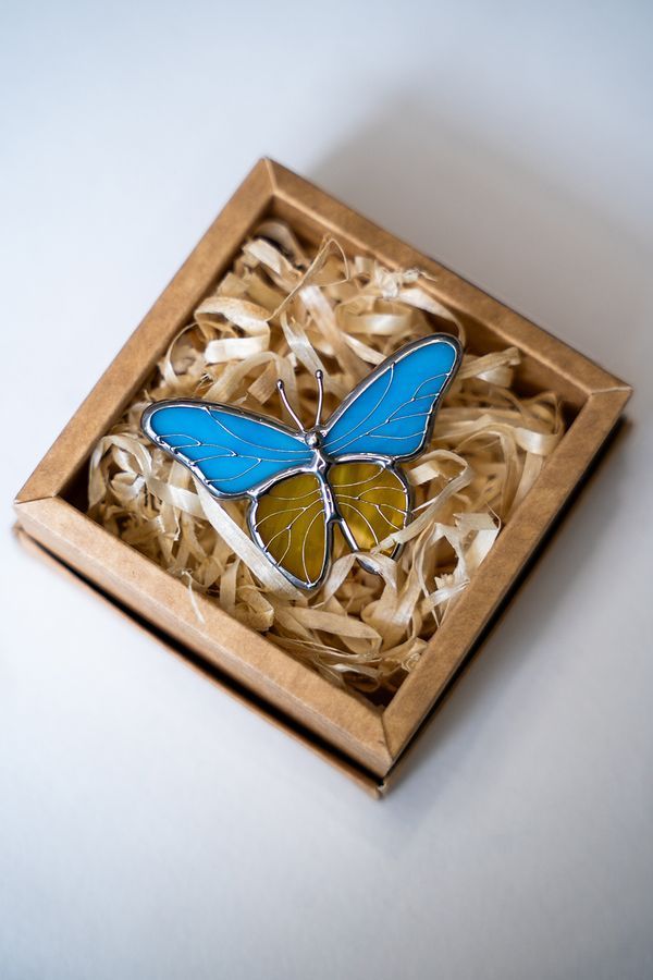 Butterfly brooch, yellow and blue