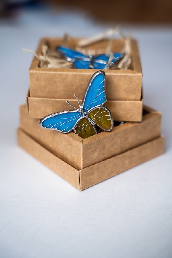 Butterfly brooch, yellow and blue